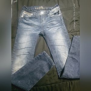 Girls Almost Famous jeans size 7.